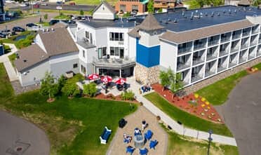 Aerial view of Park Point Marina Inn showing outdoor green spaces