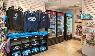 inside the gift shop showing various merchandise, including souvenir sweat shirtrs and beverages