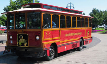 Port Town Trolley moves down the street transporting guests to attractions in Duluth